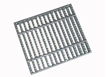 A aluminum steel grating with serrated surface on the white background.