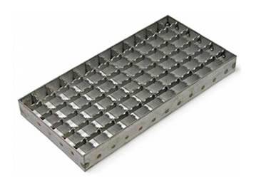 A galvanized carbon steel grating with serrated surface on the white background.