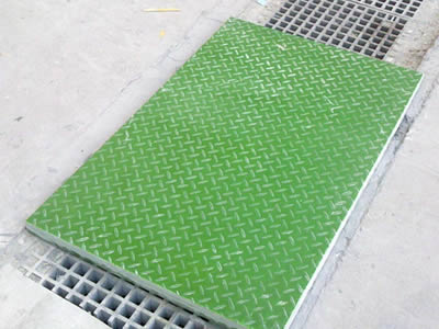 Green color covered FRP grating is installed on the drainage exit.