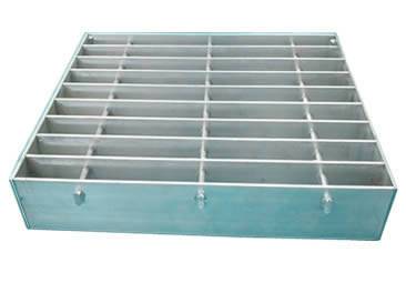 A swage-locked steel grating with plain surface on the white background.
