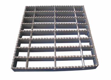 A swage-locked grating with serrated surface on the white background.
