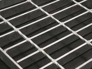 A galvanized welded steel grating with smooth surface.