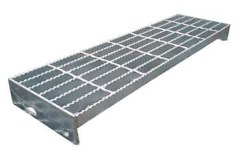 A welded steel grating stair tread with serrated surface.