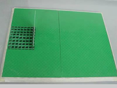 A piece of covered FRP grating with a square part drainage exit.