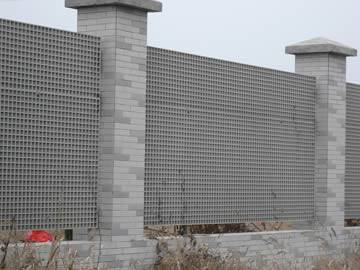 Gray gratings are installed on the wall of residence.