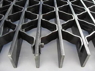 A carbon steel riveted grating on the table.